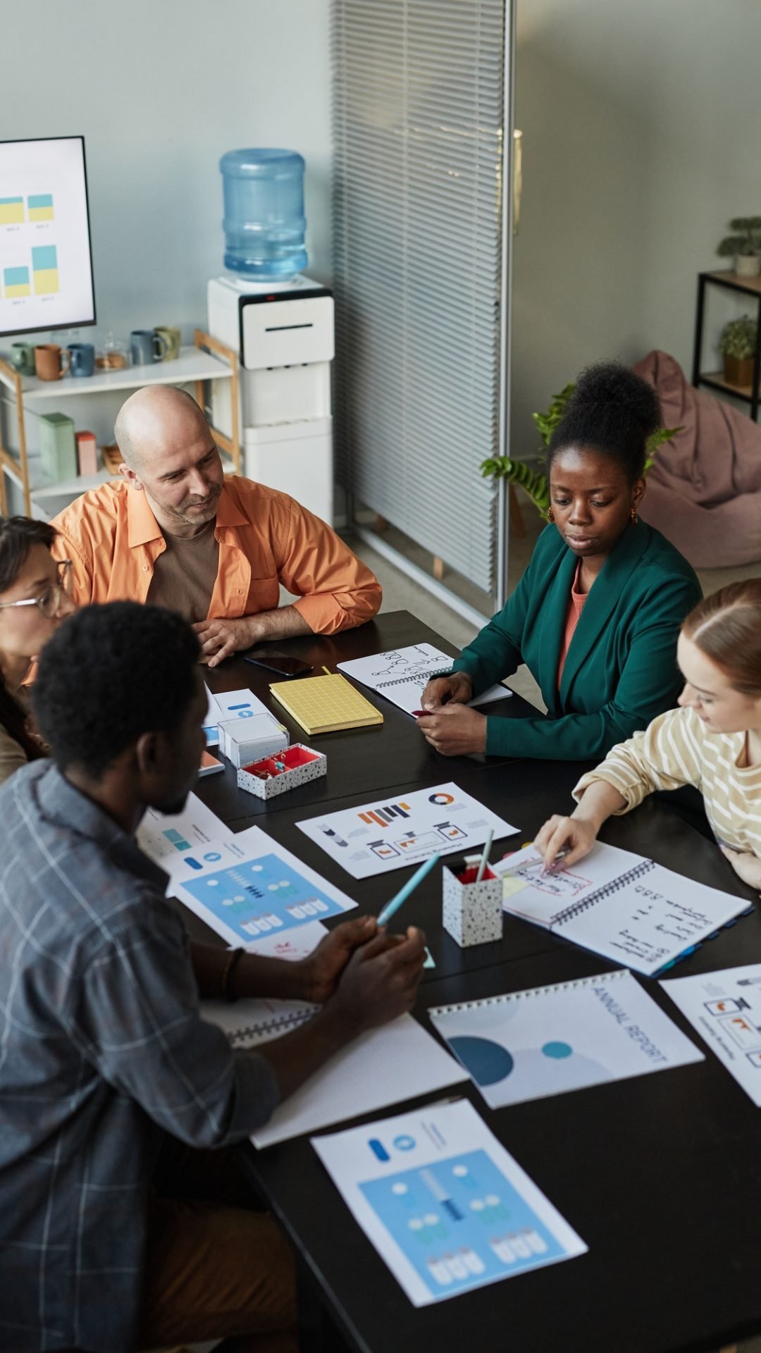 Diverse Business Team Sharing Ideas In Meeting